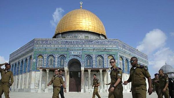 Jerusalem's Aqsa is usually the site of high tension between Israeli security forces and Palestinians, but Friday's video showed a different tension, between Fatah and Hamas. (AFP/File)