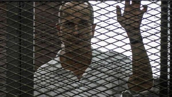 Egypt's three year sentences for the Al Jazeera journalists sparked international outrage this week, prompting the reemergence of #FreeAJStaff. (AFP/File)
