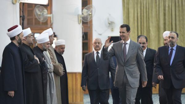 الأسد يشارك في احتفال المولد النبوي في دمشق