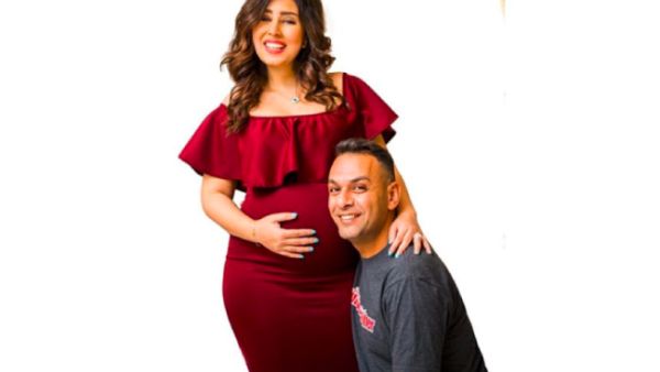 Ayten published a picture of herself looking more pregnant than ever alongside her husband Mohammed Ezz Al Arab (Source: aytenamer - Instagram)