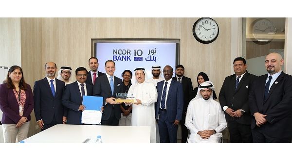 Noor Bank Team with Abdulqader Obaid Ali Chairman of UAE IAA. Noor Bank Team with Abdulqader Obaid Ali Chairman of UAE IAA.