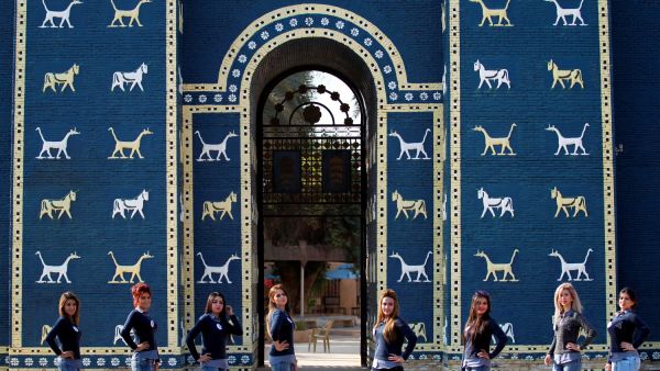 Candidates for the Miss Iraq beauty contest pose in front of the iconic Isthar gate at the ancient site of Babylon on December 17, 2015.  (AFP/Ahmad al-Rubaye)