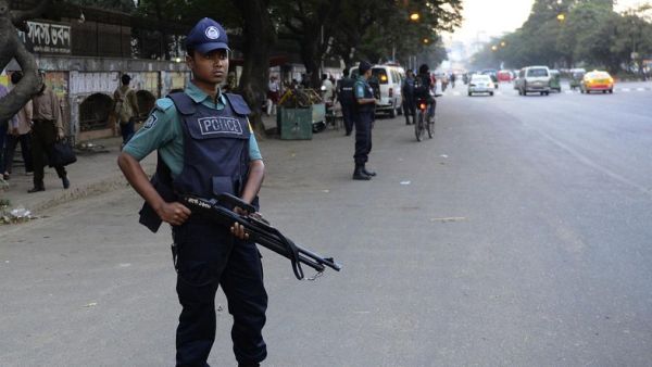 A police officer in Bangladesh watches over a busy street. (AFP/File)