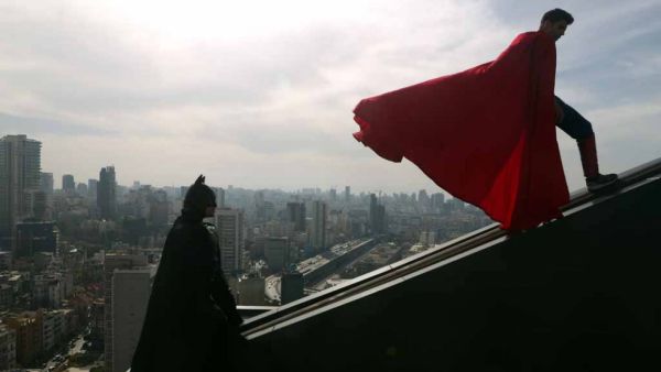 Mario and his friend dressed as Superman and Batman in Beirut. (AFP)