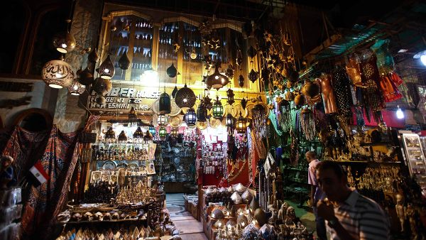 Recalling the stories of beloved Egyptian writer Naguib Mahfouz, AUC brings traditional Cairo street life to students.  (AFP/File)