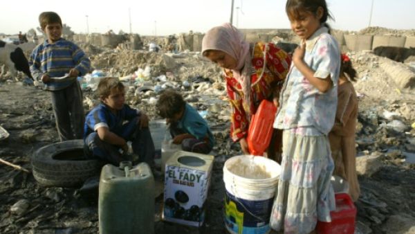 ترحيل أهالي حي كامل في بلدة عراقية بحجة تعاونهم مع داعش