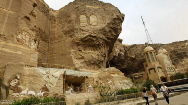 People walk near a popular Coptic church in Cairo. (AFP/File)