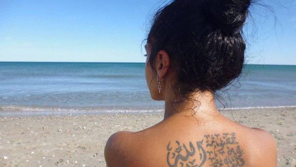 Dunia angered many of her fans by posting a picture of this anti-God tattoo. (Al Watan Voice)