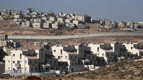 Israel's controversial barrier separating the Israeli settlement of Neve Yaakov. (AFP/File)
