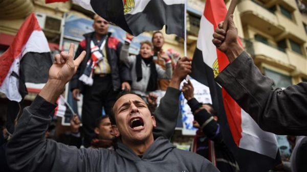 Egyptians holding national flags gather on Cairo's landmark Tahrir Square on January 25, 2016, as the country marks the fifth anniversary of the 2011 uprising. (AFP/File) Egyptians holding national flags gather on Cairo's landmark Tahrir Square on January 25, 2016, as the country marks the fifth anniversary of the 2011 uprising. (AFP/File)