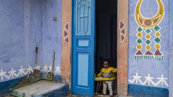 An Egyptian child looks out from the doorway of his family's home in Gharb Aswan village, near Aswan, 900 kilometres south of the capital Cairo. (AFP/File)
