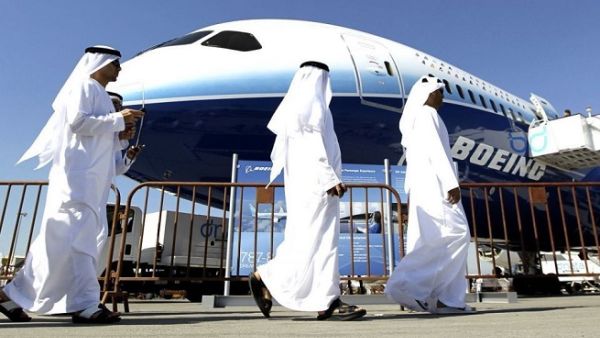 Emirati men visit the Dubai Airshow at its venue in Dubai. (AFP)