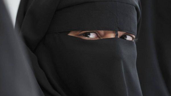 They argue the new face-covering law takes direct aim at Muslims who wear a niqab or burqa (AFP/File)