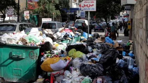 Piles of garbage block the streets in Beirut as the trash crisis continues to linger. (AFP/File)
