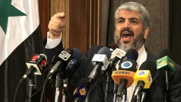 مشعل  تباحث مع كل من نائب الرئيس السوري فاروق الشرع ووزير الخارجية وليد المعلم حول وضع حماس وعلاقتها وإقامتها بدمشق 