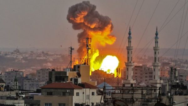 Fireball exploding in Gaza City during Israeli bombardment.