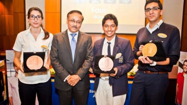 Winners of Emirates NBD Banker for a Day online competition with senior officials from the bank Winners of Emirates NBD Banker for a Day online competition with senior officials from the bank