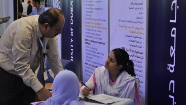 Dr. Amjad Al-Nasser, a professor in business, speak to prospective students