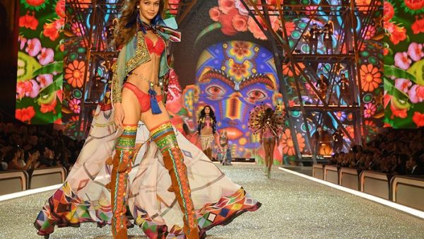 Gigi gets "choked up" every time she thinks of the Victoria's Secret Fashion Show. (GQ)