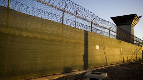 Younis Abdurrahman Chekkouri was taken into custody shortly after his flight home. (AFP/Jim Watson)