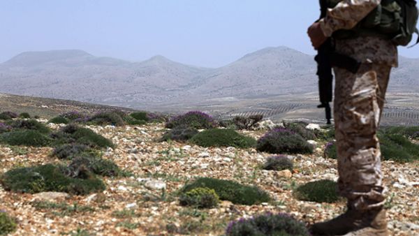 Last month, Hezbollah advanced into Arsal’s outskirts from the south and east, tightening its grip around Nusra Front militants. (AFP/File)