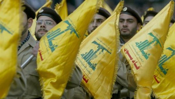 A march by Hezbollah, the Iran-backed Shiite militia recently taken off the U.S.'s list of terrorist threats.  Who gets classified as a terrorist often has much more to do with politics than anything else.  (AFP/Ramzi Haidar)