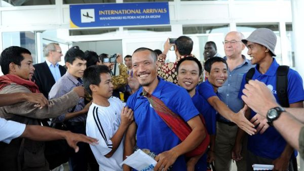 One of the hostage of Somali pirates reacts as he arrives at the Jomo Kenyatta International Airport in Nairobi on October 23, 2016 after being freed with other hostages. (AFP/Stringer)