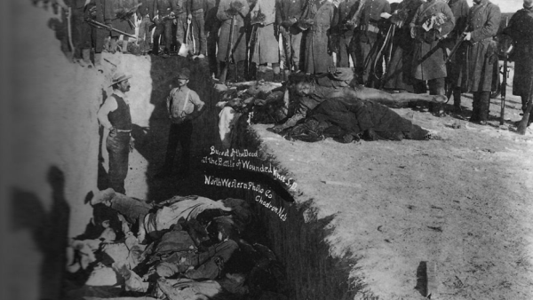 A mass grave for the people killed at Wounded Knee Creek in South Dakota in 1890. (credit: US Library of Congress/Public Domain)