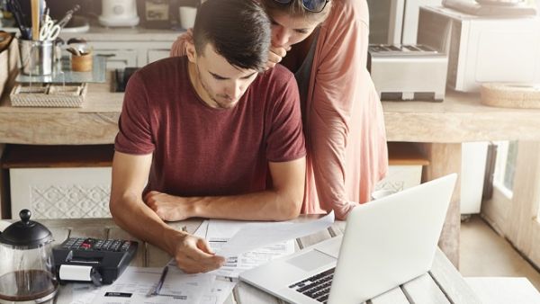 Both husband and wife should be as involved as possible in their financial planning. The journey begins with a few simple steps. (Shutterstock)