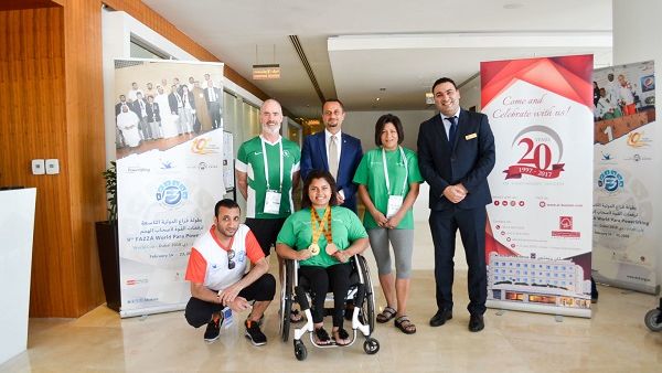 Yasser Moussa, Executive Assistant Manager, along with the Gold winner at the 9th Fazza Para Powerlifting Games 2018 and her coach. Yasser Moussa, Executive Assistant Manager, along with the Gold winner at the 9th Fazza Para Powerlifting Games 2018 and her coach.