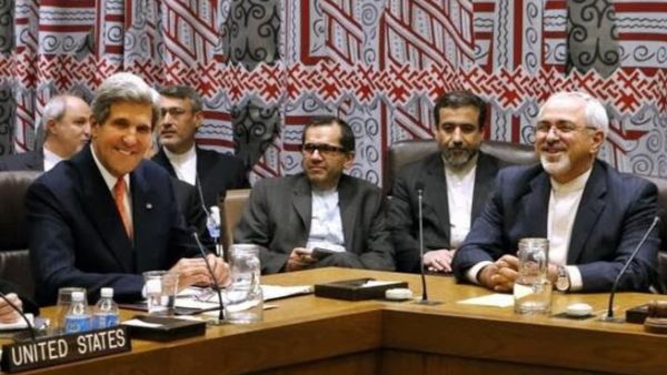 US Secretary of State John Kerry, Iranian Foreign Minister Mohammad Javad Zarif, deputy Iranian negotiators Majid Ravanchi and Abbas Araghchi seated between them against the wall at a meeting in New York in September. [AFP]