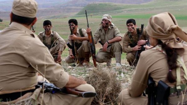 Iranian Kurdish Peshmerga members of the Kurdistan Democratic Party take part in routine military exercises in Koya in northern Iraq on Dec. 9, 2014. (AFP/File)