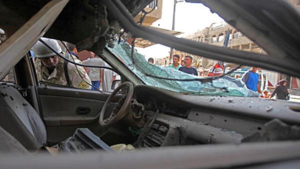 Post suicide car bomb at Iraqi checkpoint. [csmonitor]