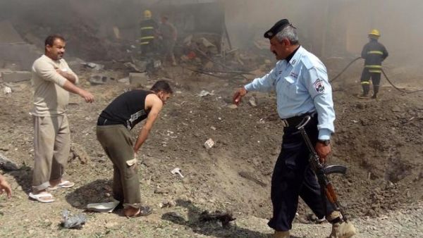 A suicide bomb attack in Kirkuk, Iraq on March 29 (AFP Photo)