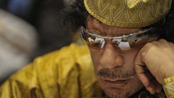 Moammar Gadhafi, then Libya's chief of state, attending the 12th African Union Summit in Addis Ababa, Ethiopia, Feb. 2, 2009. Qaddafi was elected chairman of the organization. (Source: Wikimedia/Jesse B. Awalt)