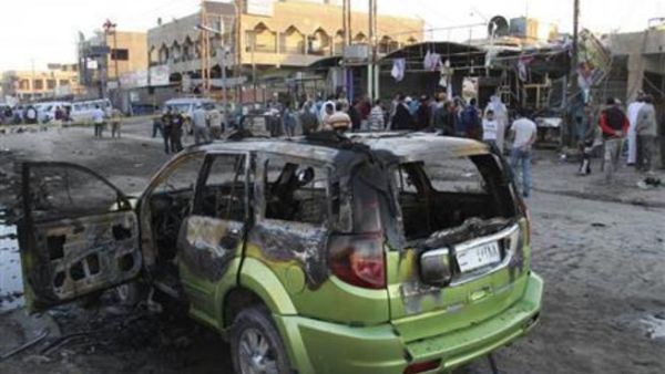 موقع احد التفجيرات في بغداد الثلاثاء