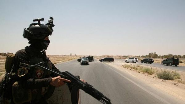 An Iraqi soldier stands guard near Ramadi. (AFP/Azhar Shallal)