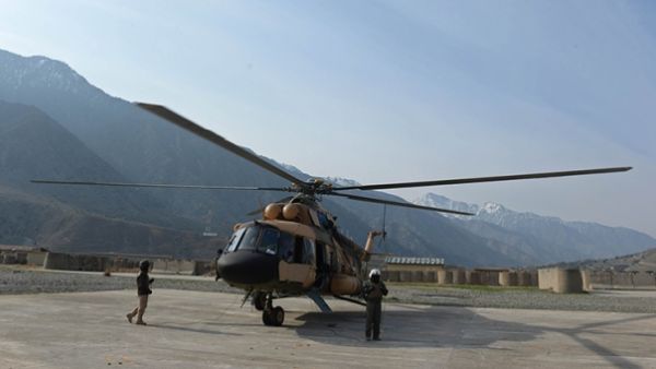 An Mi-17 military helicopter, like the one pictured here, killed nine people when it crashed south of Baghdad on Tuesday. (AFP/File)