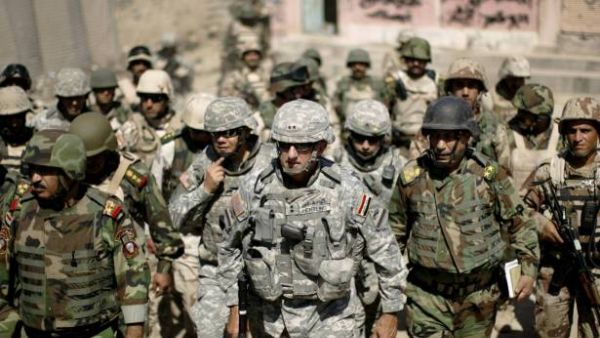 Iraqi and American troops are seen on patrol in Mosul. (AFP/File)