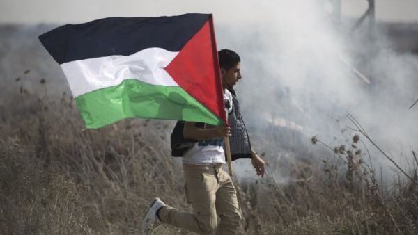 Protests are becoming increasingly frequent in the West Bank village of Kafr Qaddum after residents lost land to Israeli settlements, outposts, and a separation wall. (AFP/File)