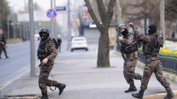 Istanbul police walk down a street in full gear. (AFP/File) Istanbul police walk down a street in full gear. (AFP/File)