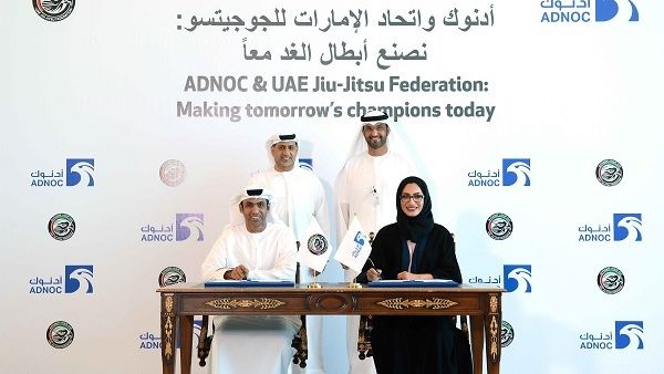 The agreement was signed by Reem Al Buainain, Manager CSR, at ADNOC, and Fahad Al Shamsi, CEO of the UAE Jiu-Jitsu Federation. The agreement was signed by Reem Al Buainain, Manager CSR, at ADNOC, and Fahad Al Shamsi, CEO of the UAE Jiu-Jitsu Federation.