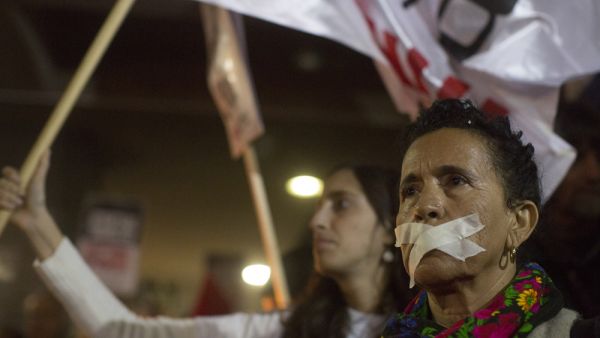A protest in solidarity with human rights and anti-occupation organizations that had been targeted by right-wing groups and politicians in previous weeks, Tel Aviv, December 19, 2015. (Oren Ziv/Activestills)