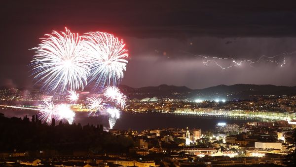 Revelers had been watching the annual Bastille Day fireworks display, which this year was accompanied by lightning, when the attacker struck.
 (AFP / Valery Hache)