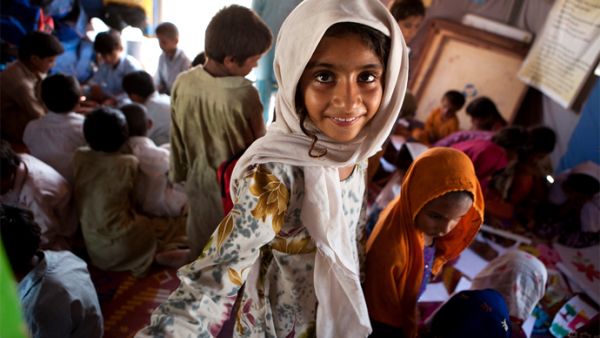 Children play at the Child Friendly Space funded by Trócaire on the outskirts of Hyderabad, southern Pakistan. The Child Friendly Space offers a place for children left homeless by last year's floods to play and learn. (Photo: Luca Tommasini / Trócaire).