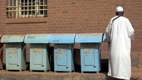 A man sends a letter at a post office in Khartoum, Sudan.  (Flickr Creative Commons/David Stanley)
