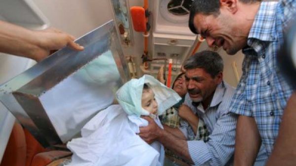 دفن الطفل السوري الغريق وأخيه ووالدته في كوباني
