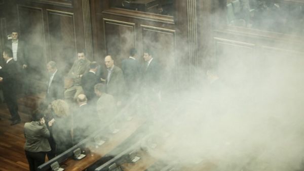 كان نواب المعارضة أطلقوا الغاز المسيل للدموع في البرلمان الأسبوع الماضي - أ ف ب
