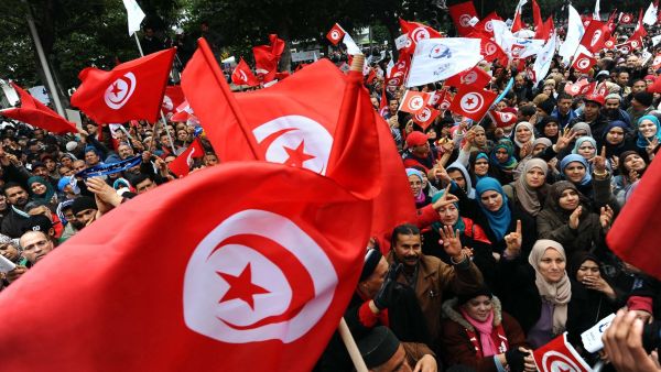 Tunisians gather at a rally during elections in 2014. (File Photo)