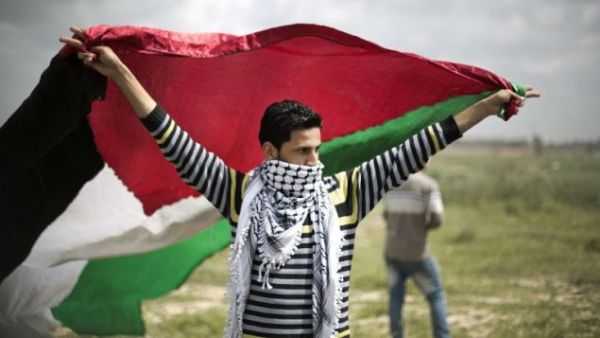 A Palestinian protester on Land Day in 2014, Gaza. (AFP/file)